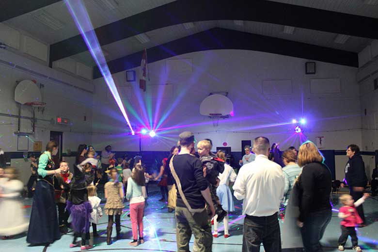 School Light Show, Hamilton DJ, Family dance showing the guests with light show in the background. Taken in Hamilton Ontario.